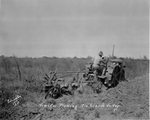 Photograph of a tractor plowing in Rio Grande Valley by Edrington Studio (Weslaco, Tex.)