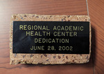 [RAHCH] Photograph of RAHC Harlingen dedication slab piece by University of Texas Health Science Center at San Antonio. Library