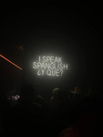 Photograph of "I Speak Spanglish ¿y qué?" Sign by Sara E. Azua and Viviana Veronica Garza