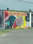 Photograph of Cellphone Repair Sign by Sara E. Azua and Maria Garcia