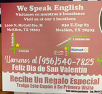 Photograph of "We Speak English" Sign by Sara E. Azua and Nataly Salazar