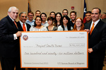 [PUF Check] Photograph of Chancellor Francisco Cigarroa, MD,  presenting 1st PUF check - 09