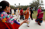 [Charro Days] Photograph of UT Brownsville President Dr. Juliet Garcia Greeting Participants by University of Texas at Brownsville and Paul Chouy