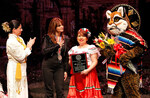 [Mr. Amigo] Photograph of Teri Alarcon, Stephanie Mendez, and Ozzie the Ocelot Recognizing Mariana Seoane by University of Texas at Brownsville and Paul Chouy