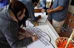 [Dream Rally] Photograph of Students Making Signs by University of Texas at Brownsville and Paul Chouy