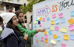 [Dream Rally] Photograph of Students Looking at Dream Board by University of Texas at Brownsville and Paul Chouy