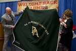 [Alumni] Photograph of Alumni with 1958 Big State Conference Championship Banner